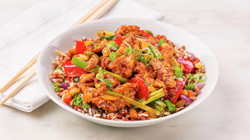 Kung Pao Chicken Bowl · Tender chicken stir-fried with red peppers, scallions, and peanuts, tossed with our Szechuan chili paste and served with your favorite Asian rice, noodles or stir-fried vegetables. Made fresh to order!
