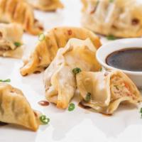 Pan-Seared Pork Pot Stickers - 6 Pack · Pan-seared dumplings stuffed with tender seasoned ground pork, hot and made fresh to order. ...