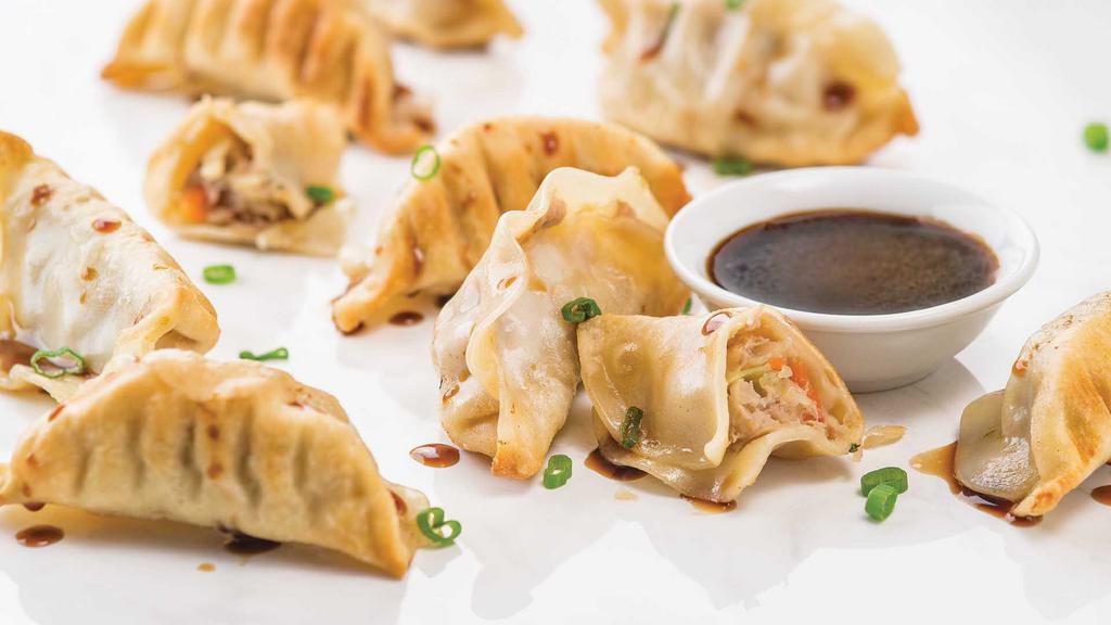 Pan-Seared Pork Pot Stickers - 6 Pack · Pan-seared dumplings stuffed with tender seasoned ground pork, hot and made fresh to order. Includes our signature dipping sauce.