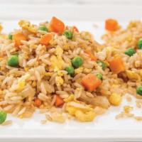 Vegetable Fried Rice · Stir-fried rice, cooked to perfection, with vegetables, egg, and hints of sesame and soy sau...