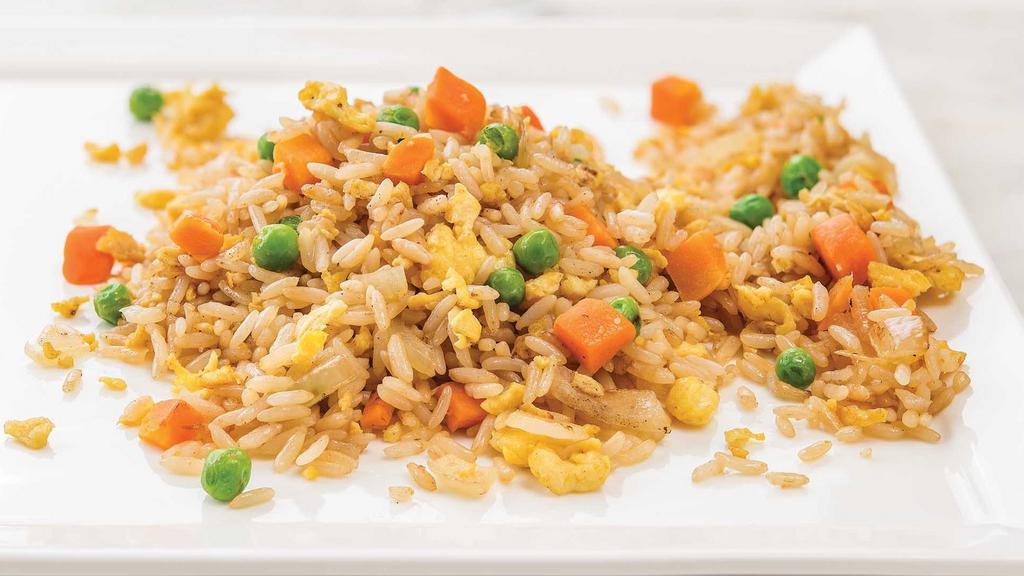 Vegetable Fried Rice · Stir-fried rice, cooked to perfection, with vegetables, egg, and hints of sesame and soy sauce. Hot and made fresh to order. 16 oz. Serves 1-2.