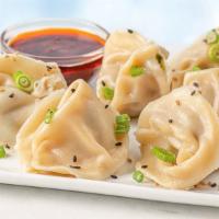 Spicy Pork Wontons With Chili Dumpling Sauce - 6 Pack · Delicious steamed pork wontons served with chili dipping sauce.
