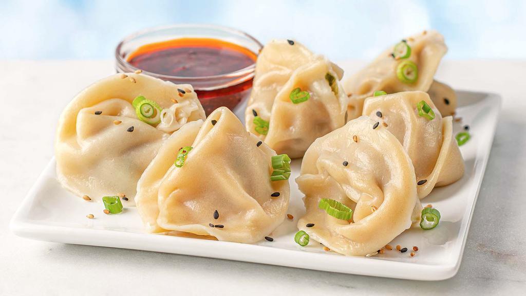 Spicy Pork Wontons With Chili Dumpling Sauce - 6 Pack · Delicious steamed pork wontons served with chili dipping sauce.
