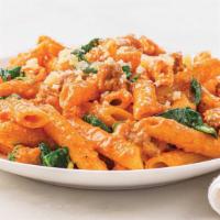 Penne With Sausage, Spinach And Vodka Blush Sauce · Served hot, our penne pasta is tossed with rich vodka blush sauce, Italian pork sausage, and...