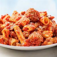 Rigatoni With Sunday Sauce · Served hot, our signature Sunday Sauce has all the slow-simmered flavors of tender beef shor...