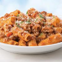 Rigatoni Bolognese · Ready to heat, our traditional Bolognese sauce made with beef, pork, and veal, is served ove...