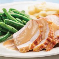 Roasted Turkey Meal · Ready to heat, our juicy oven-roasted turkey slices are paired with flavorful homestyle grav...