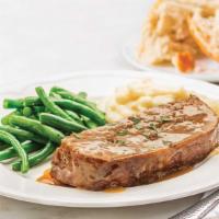 Homestyle Meatloaf Meal · Ready to heat, our savory all-beef meatloaf is topped with homestyle gravy and paired with o...