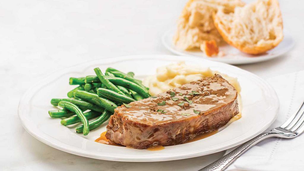 Homestyle Meatloaf Meal · Ready to heat, our savory all-beef meatloaf is topped with homestyle gravy and paired with our signature whipped potatoes and seasoned green beans.