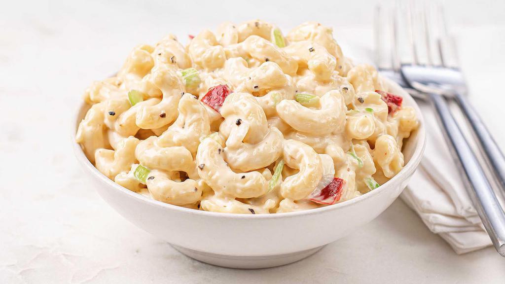 Homestyle Macaroni Salad · Classic macaroni salad with traditional elbow pasta, celery, onion, and red peppers, tossed in mayonaise, mustard, and spices. Made with no artificial colors, flavors or preservatives. 13 oz.