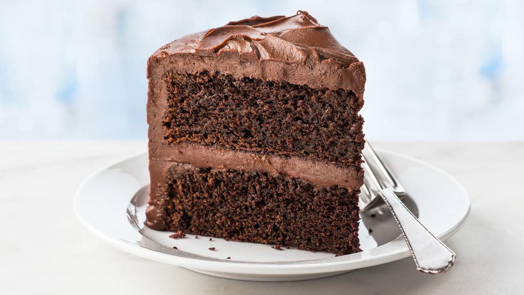 Ultimate Chocolate Cake Slice · Moist 2-layer cake with incredibly rich chocolate flavor and thick, fudgy frosting.