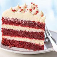 Red Velvet Cake Slice · Three layers of moist, tender red velvet cake filled and topped with cream cheese icing and ...