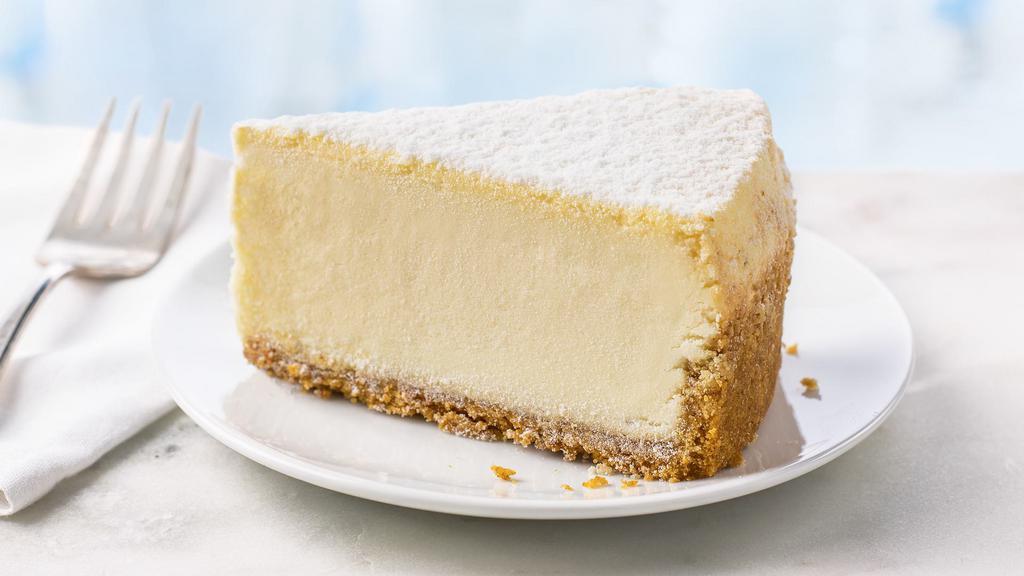 Ultimate Plain Cheesecake Slice · Light, creamy-textured New York-style cheesecake with traditional homestyle graham cracker crust.