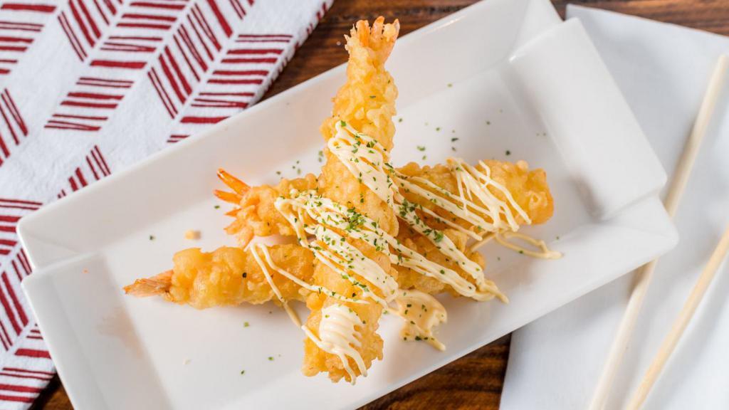 Shrimp Tempura Udon · Udon noodles in miso soup with 3 pieces of Shrimp Tempura on the side