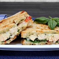 Meatless Panini · Grilled Panini Sandwich made with Mozzarella cheese, plum tomatoes, basil, spinach, sundried...