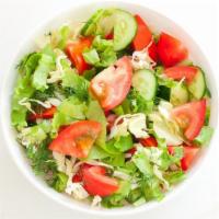 Garden Salad · Freshly prepared salad topped with Crispy leaf lettuce, Romaine lettuce, cucumbers carrots t...