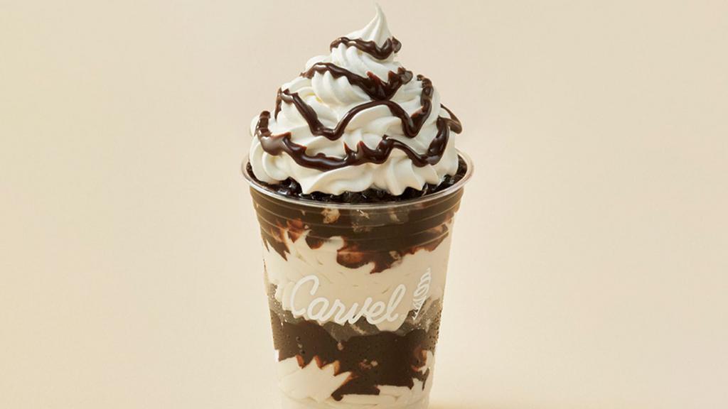 Oreo® Cookie Sundae Dasher® · Layers of Oreo® cookies, vanilla ice cream and fudge topped with whipped cream and fudge drizzle.