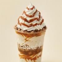Heath® Sundae Dasher®  · Layers of Heath® pieces, vanilla or chocolate ice cream and caramel topped with whipped cream.