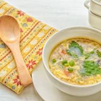 Egg Drop Soup  · Served with noodle.