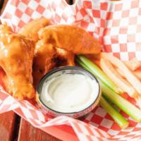 1202. Epic Jumbo Wings Bucket (16) · Sixteen Wings That Come With Ranch Dressing and Celery.