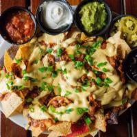 1215. Shack'S Chili N' Cheese Nachos · Guacamole, Salsa, Sour Cream, Jalapeños, Green Onion and Black Olives (Chili Comes Separate).