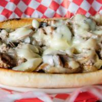 1241. Philly Cheese Steak Sandwich · 1/4 lb of sliced grilled Rib Eye, smothered with Mushrooms, Onion, Swiss Cheese, and Mayo se...