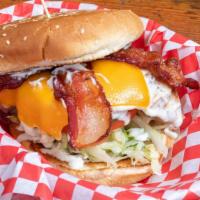 1254. Bacon Cheddar Chicken Sandwich · Topped with sliced Bacon, Melted Cheddar and Ranch Dressing. Add a side of fries, tots, onio...