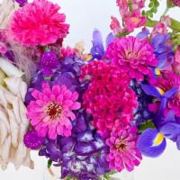 Pretty In Pink · This lush floral design is teeming with the best shades of pinks. Purple hydrangea and hot p...