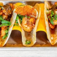 Camarones Tacos · Marinated shrimp a la plancha (seared) served with pineapple jalapeno salsa, cotija cheese, ...