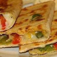Espana Quesadillas. Grilled Ham, Muenster Cheese, Onions, Red & Green Peppers , Salsa · Grilled ham, muenster cheese, onions, red and green peppers, salsa.