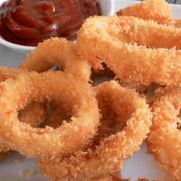 Onion Rings · Deep fried onion rings with ketchup on the side