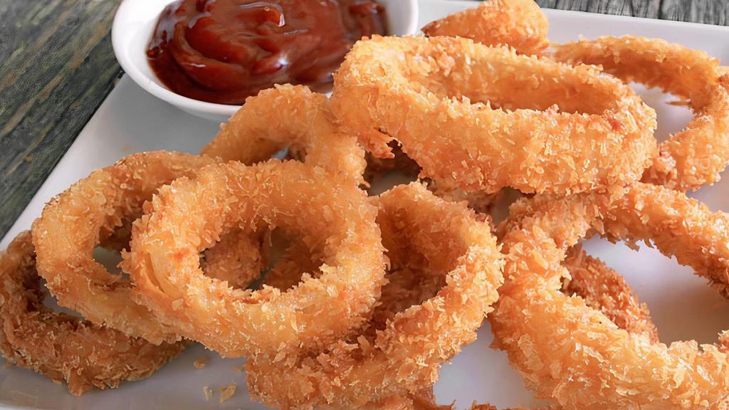 Onion Rings · Deep fried onion rings with ketchup on the side
