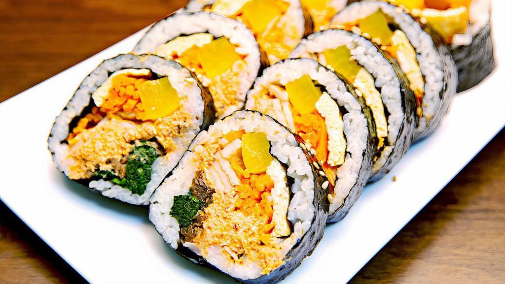 Spicy Tuna Kimbap(매운참치 김밥) · Spicy tuna salad, yellow pickle radish, burdock, egg, spinach, fish cake, sesame oil and seasoned rice with seaweed.