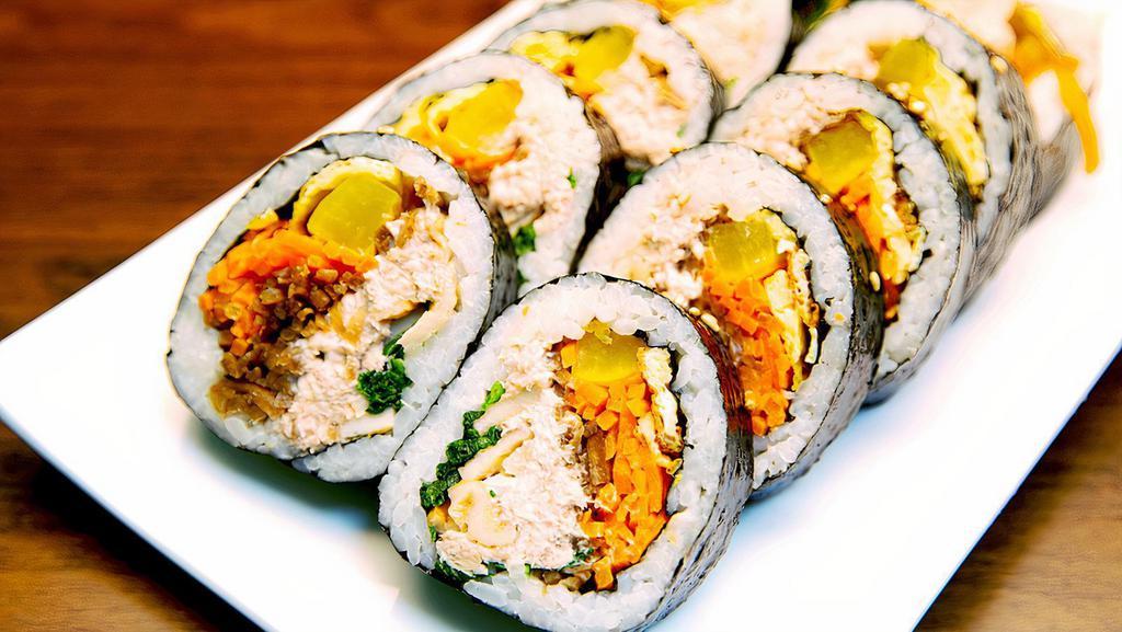 Tuna Kimbap(참치김밥) · Tuna salad, yellow pickle radish, carrot, burdock, egg, spinach sesame oil and seasoned rice with seaweed.