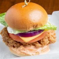 Spicy Chicken Burger · Deep fried spicy chicken thigh patty with your choice of add-ons and our homemade sauce.