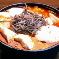 Beef Soft Tofu Stew (소고기순두부) · Spicy. soft tofu stew with Beef, vegetables, soft tofu and egg in spicy broth. Served with r...