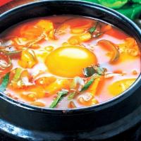 Kimchi Soft Tofu Stew (김치순두부) · Spicy. soft tofu stew with home made Kimchi, vegetables, soft tofu and egg in spicy broth. S...