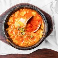 Soondooboo Jigae · A casserole with soft bean curd, baby clams, shrimp and oysters in mildly spicy broth.