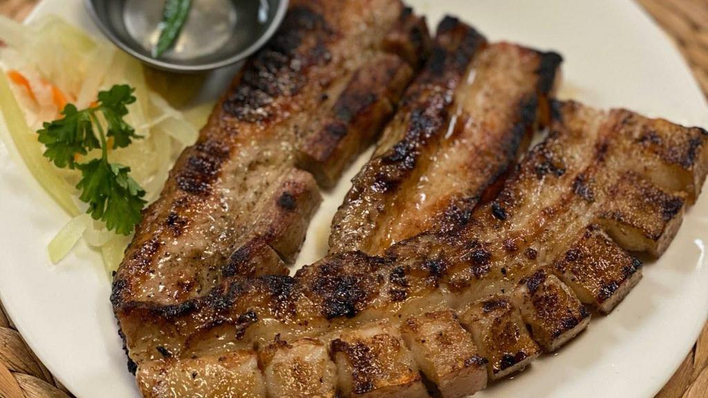 Inihaw Liempo · Grilled pork belly strips with or without Renee's BBQ sauce, and Renee's atchara.