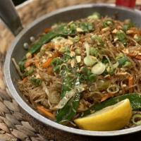 Bihon Guisado · Sautéed rice noodles with shrimp, pork, and vegetables.