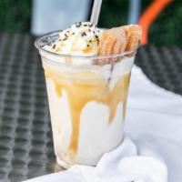 Caramel Churro · Hand Spun Caramel shake with one of our famous Bavarian Creme Filled Churros inside!