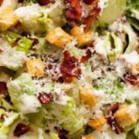 Caesar Salad · Romaine, Garlic Knot Croutons, Parmesan, Caesar Dressing.
