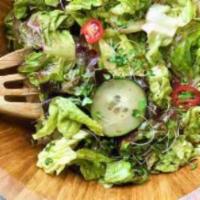 House Salad · Mixed Greens, Seasonal Vegetables, Balsamic Vinaigrette.
