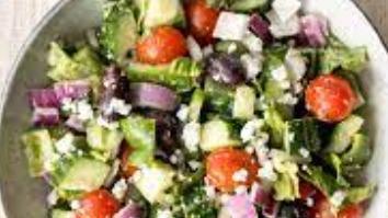 Greek Salad · olives, feta, vegetables, and house dressing, peppers, onions, cucumbers and tomatoes.