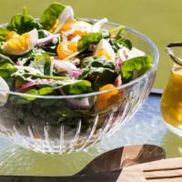 Spinach, Mushroom And Orange Salad · Fresh salad on gorgonzola cheese tossed with raspberry vinaigrette.