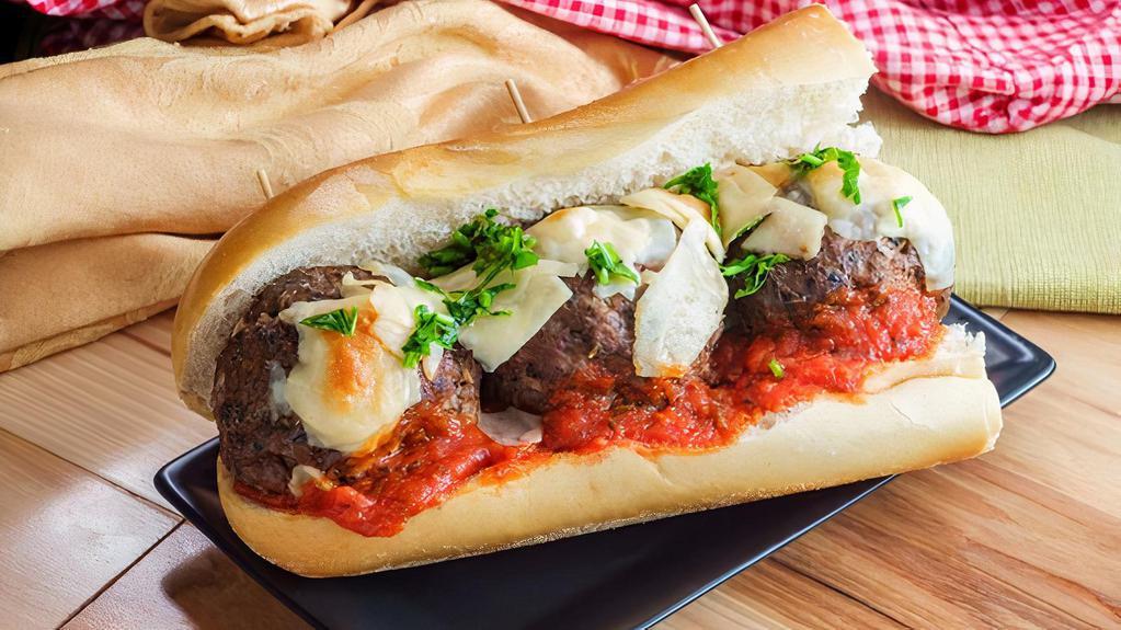 Meatball Parmigiana Hero Sandwich · Delicious sandwich made with Meatballs and Parmesan cheese. Customizable to customer's preference.