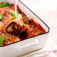 Eggplant Rollatini · 3 pieces of Eggplant that are fried and rolled up with a ricotta filling, and then topped wi...
