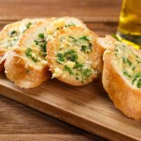 Garlic Bread · Italian bread topped off with extra virgin olive oil, garlic, olive oil, and parmesan cheese.