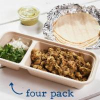 Spiced Chicken Verde · (four or eight tacos per serving). diced chicken in chile and herb marinade topped with a fr...