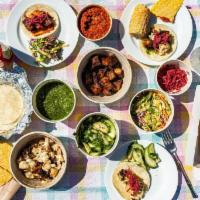 Family Pack · choose any 2 taco fillings (makes 16 tacos) + 3 sides. family pack comes with salsa verde + ...
